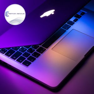 Open laptop illuminated with purple lighting representing professional laptop repair and diagnostics.