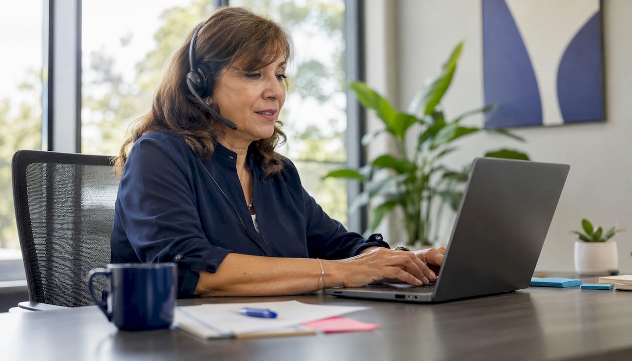 Customer support agent assisting phone repair clients