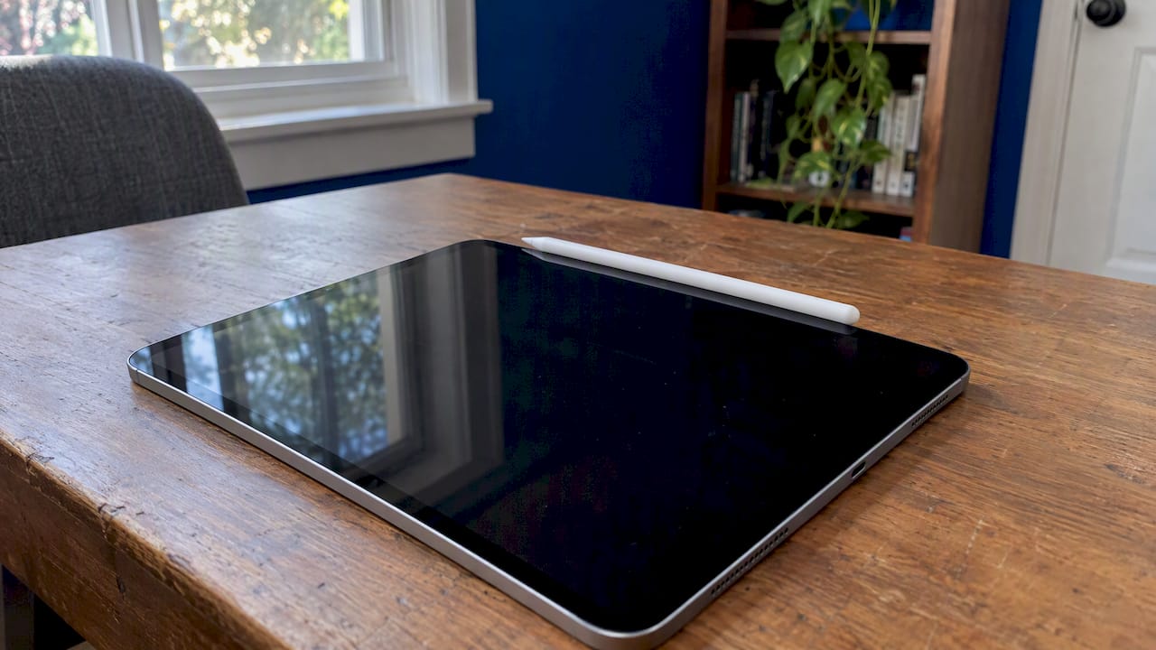 Apple Pencil Pro attached to compatible iPad